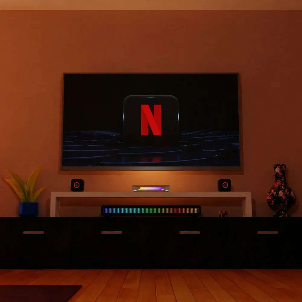 Téléviseur Samsung à écran plat allumé sur un meuble TV